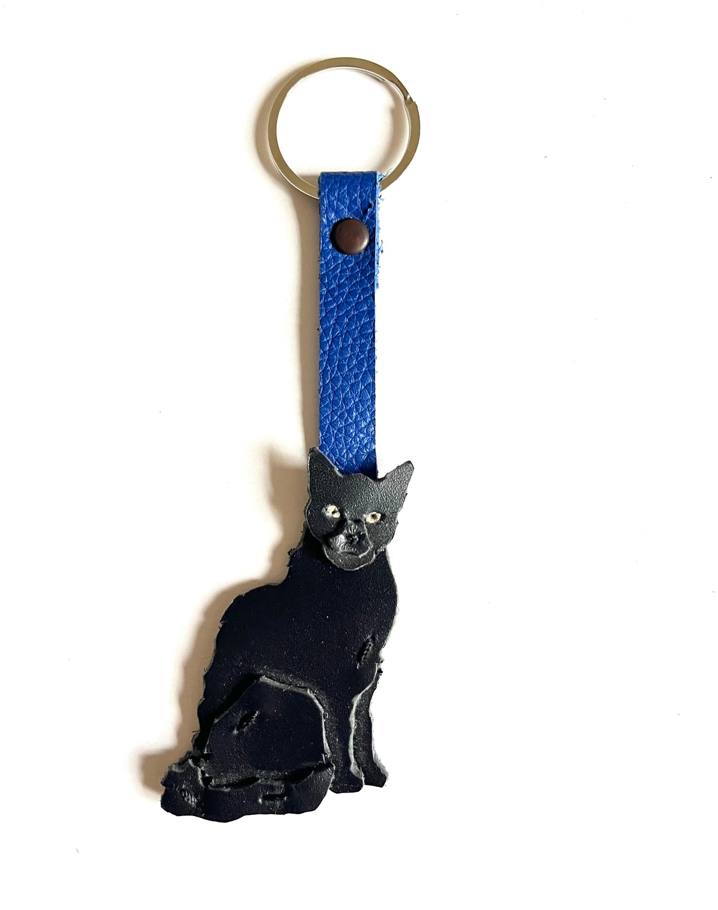 Gato negro de ojos verdes